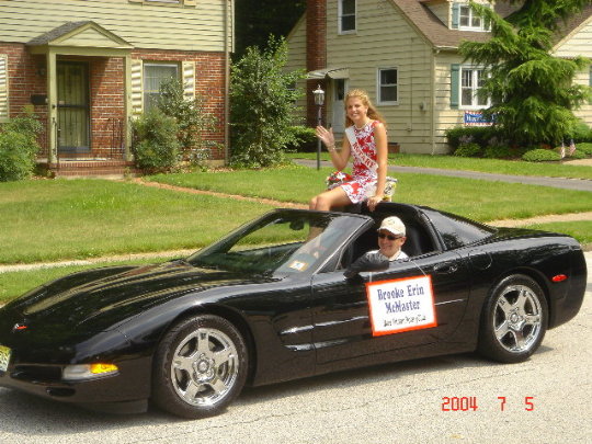 Steve Simmerman driving Miss Rotary in parade